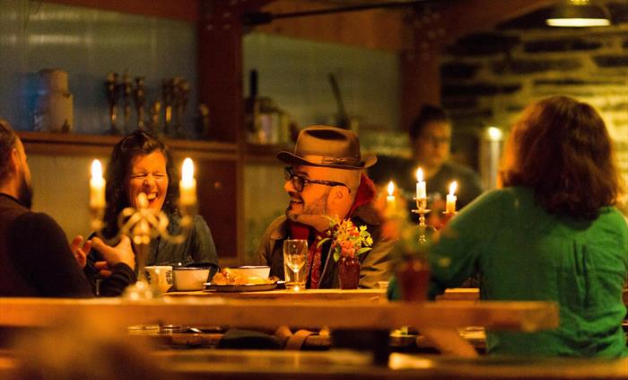 Dining in the lodge barn (photo: Sarah Falugo)